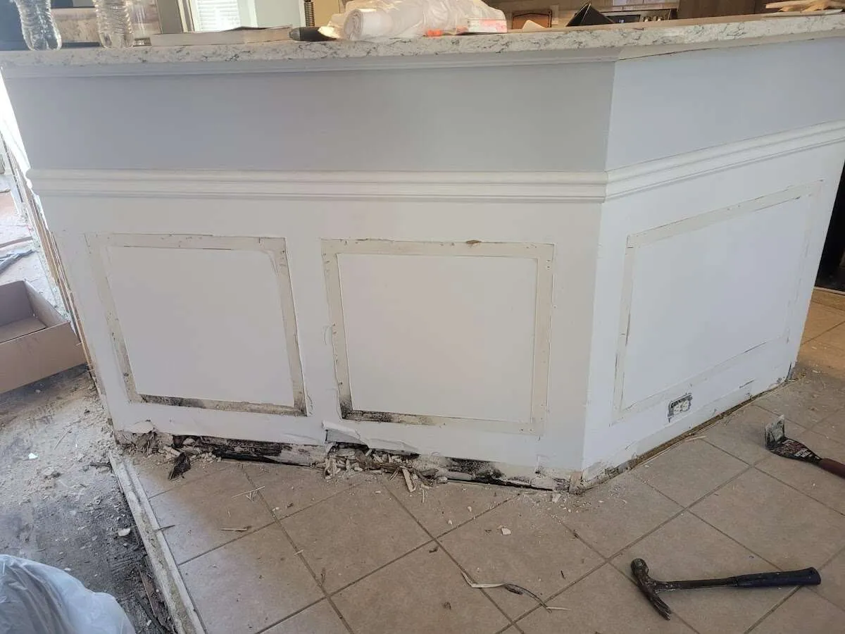 Water damage and mold on kitchen during Storm Damage Restoration in Belen